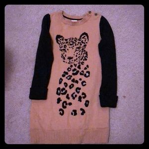 Super cute sweater goers dress.